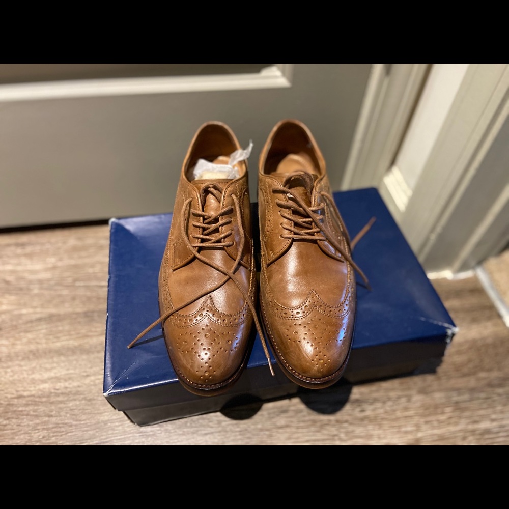A men’s chestnut colored dress shoe